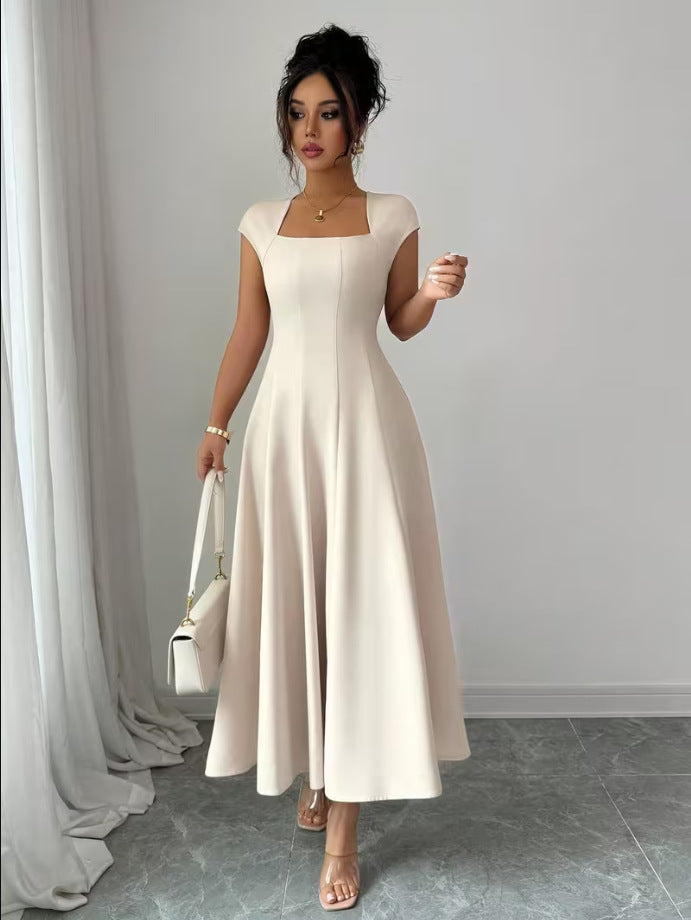 Damer Elegant Maxiklänning med rektangulär halsringning och flödande kjol Mirla-Eva Jonsson