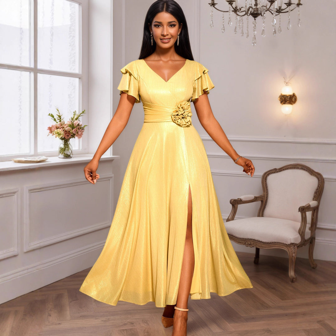 Damer Elegant Maxiklänning med rik volang och blomsteraccent Mirla-Eva Jonsson