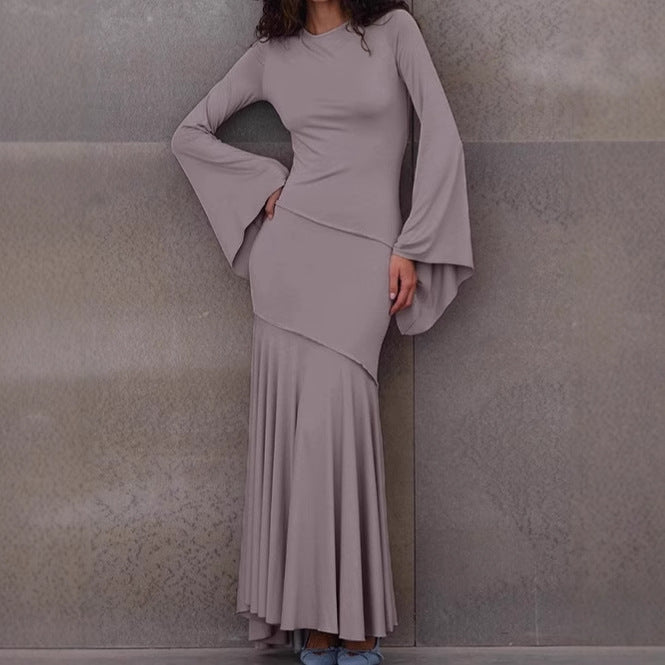 Damer Elegant Maxiklänning med svängande fåll och vida ärmar Mirla-Eva Jonsson