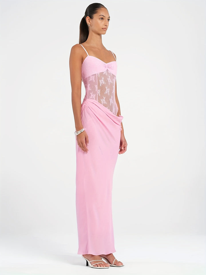 Damer Elegant Maxiklänning med transparenta spetsdetaljer och figurnära skärning Mirla-Eva Jonsson