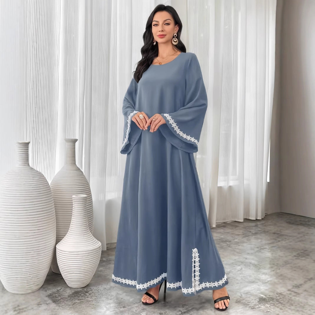 Damer Elegant Maxiklänning med utsvängda ärmar och subtila spetsdetaljer Mirla-Eva Jonsson
