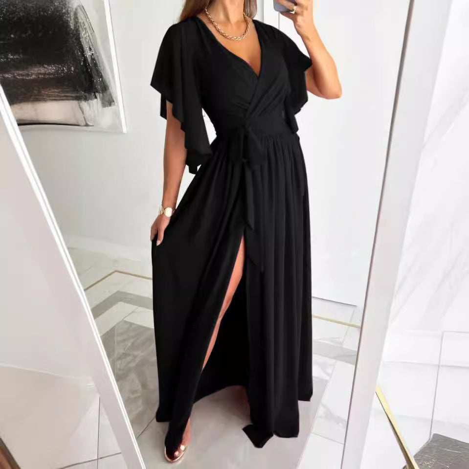 Damer Elegant Maxiklänning med voluminösa ärmar och stiligt benslits Mirla-Eva Jonsson