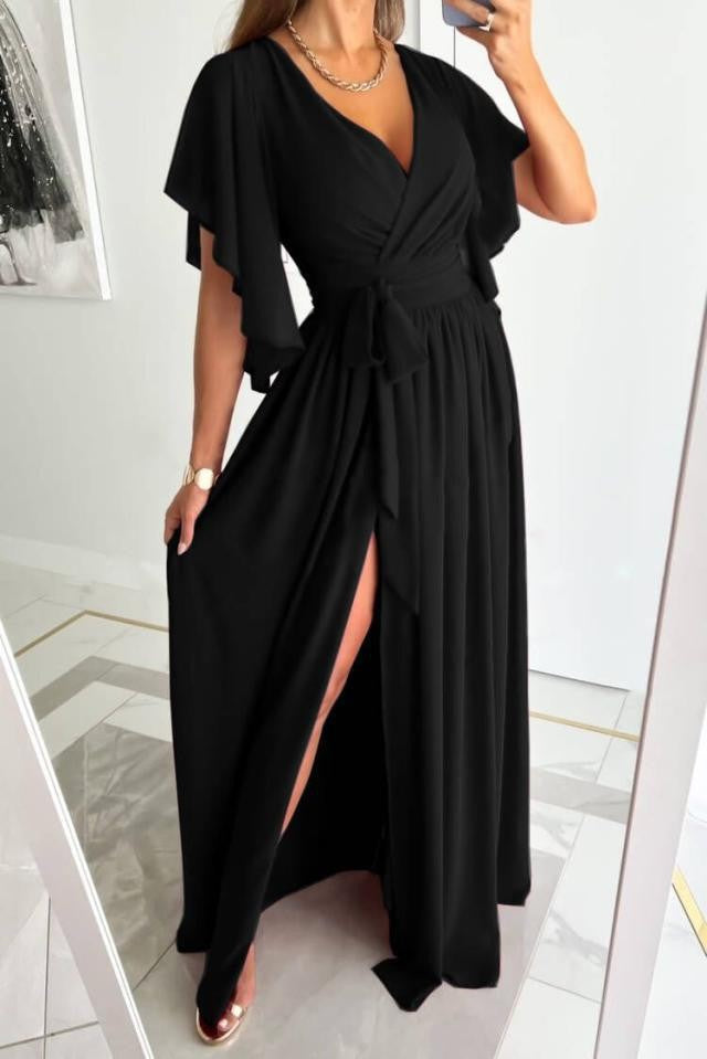 Damer Elegant Maxiklänning med voluminösa ärmar och stiligt benslits Mirla-Eva Jonsson