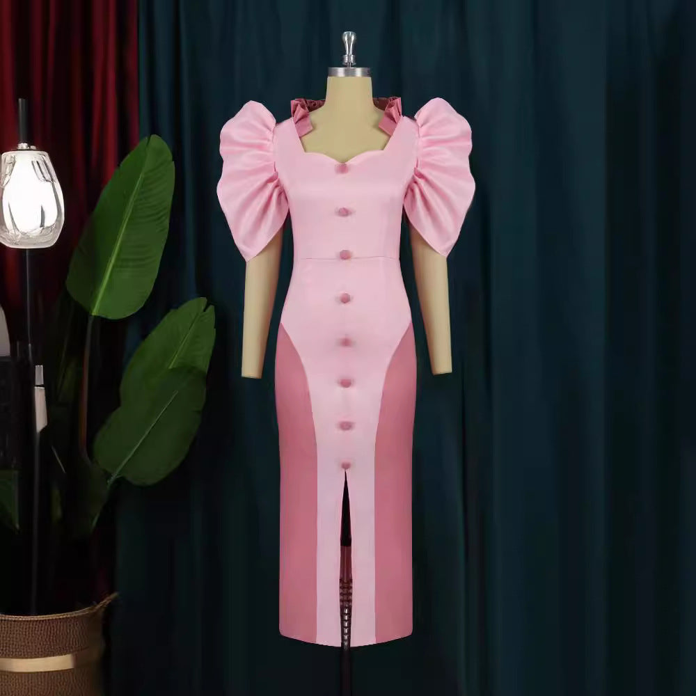 Damer Elegant Maxiklänning med voluminösa puffärmar och knapppdetaljer Mirla-Eva Jonsson