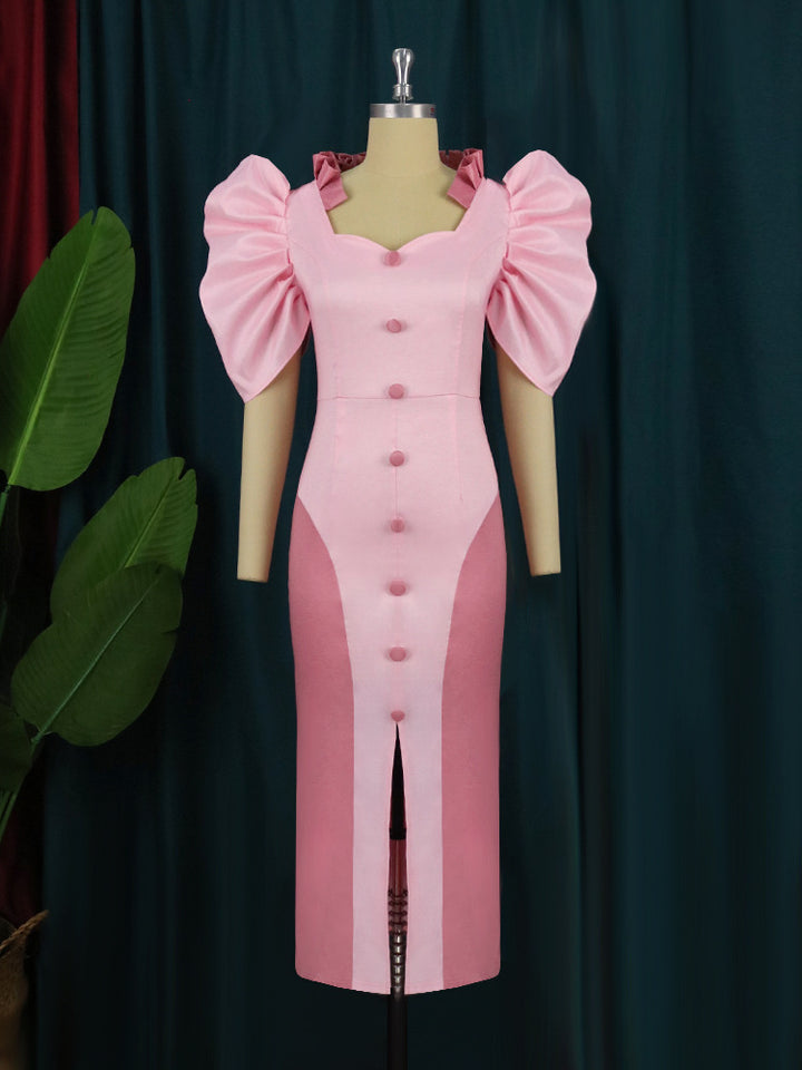 Damer Elegant Maxiklänning med voluminösa puffärmar och knapppdetaljer Mirla-Eva Jonsson