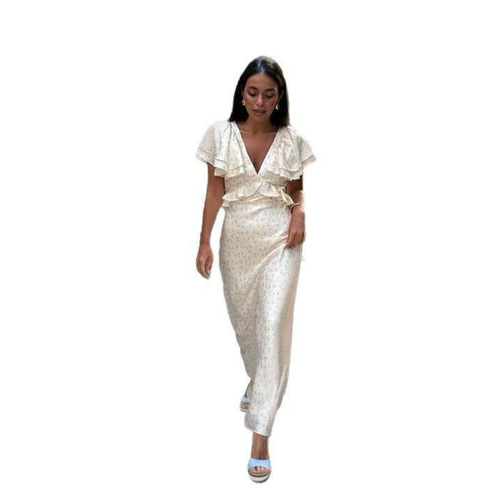 Damer Elegant Maxiklänning med voluminösa volanger och djup V-ringning Mirla-Eva Jonsson