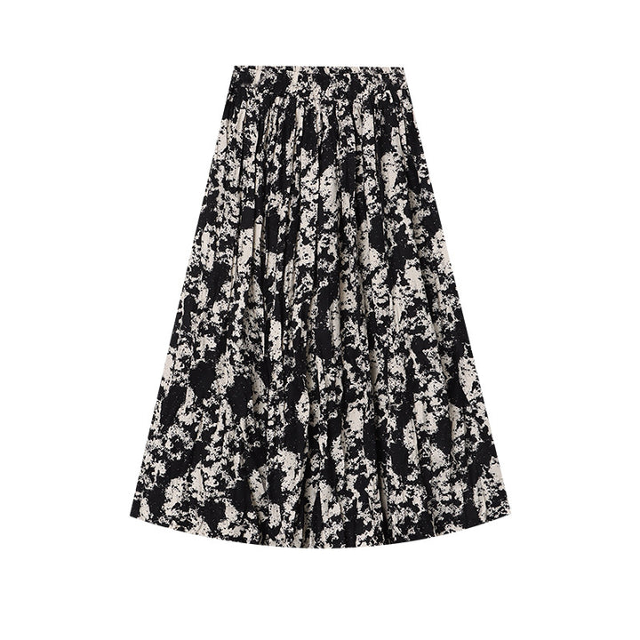 Damer Elegant Midi Kjol med Blommig Tryck och Luftig Silhuett Mirla-Eva Jonsson