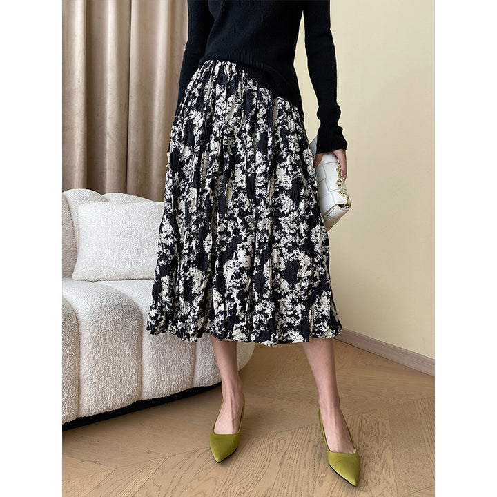 Damer Elegant Midi Kjol med Blommig Tryck och Luftig Silhuett Mirla-Eva Jonsson