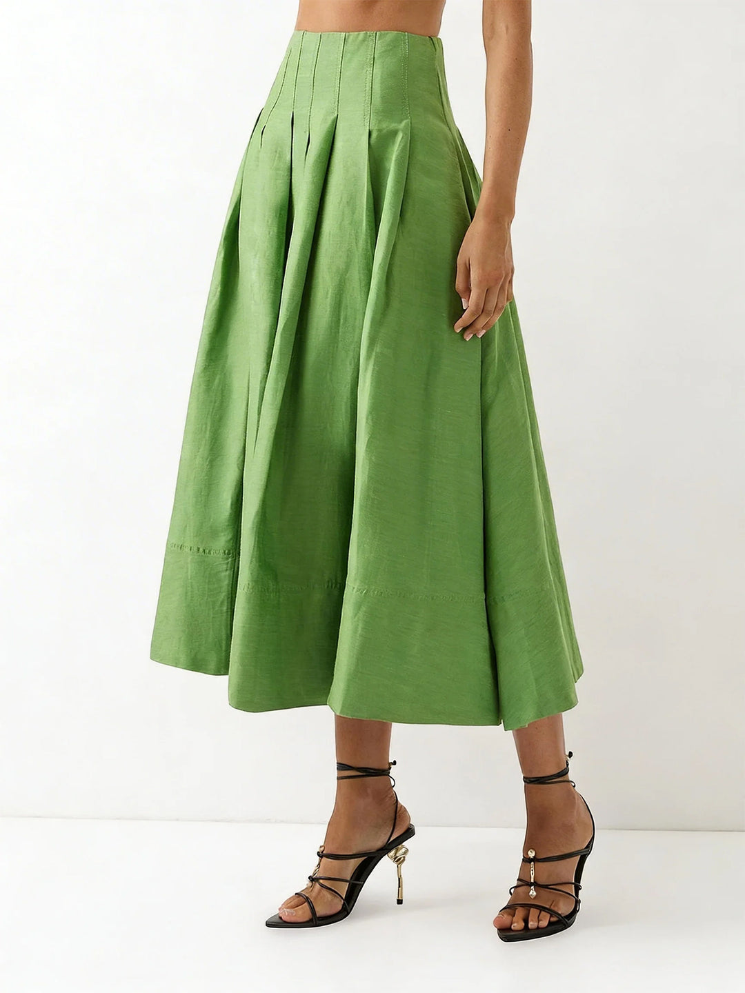 Damer Elegant Midi Kjol med Flödande Snitt och Sida Fickor-Eva Jonsson