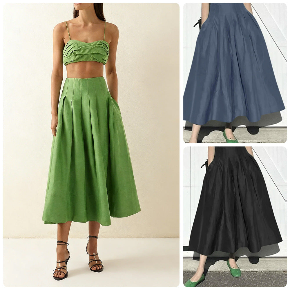 Damer Elegant Midi Kjol med Flödande Snitt och Sida Fickor-Eva Jonsson