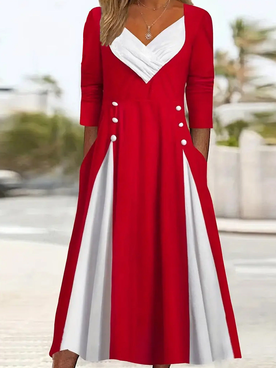 Damer Elegant Midi-klänning med asymmetrisk fåll och stiliga knappdetaljer Mirla-Eva Jonsson
