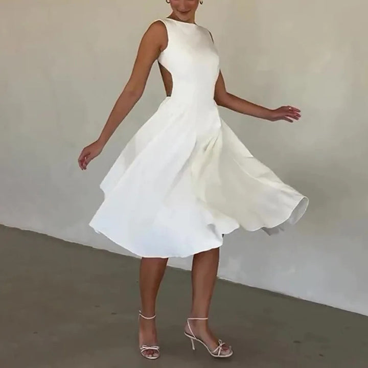 Damer Elegant Midi-klänning med figursydd överdel och svängande kjol Mirla-Eva Jonsson