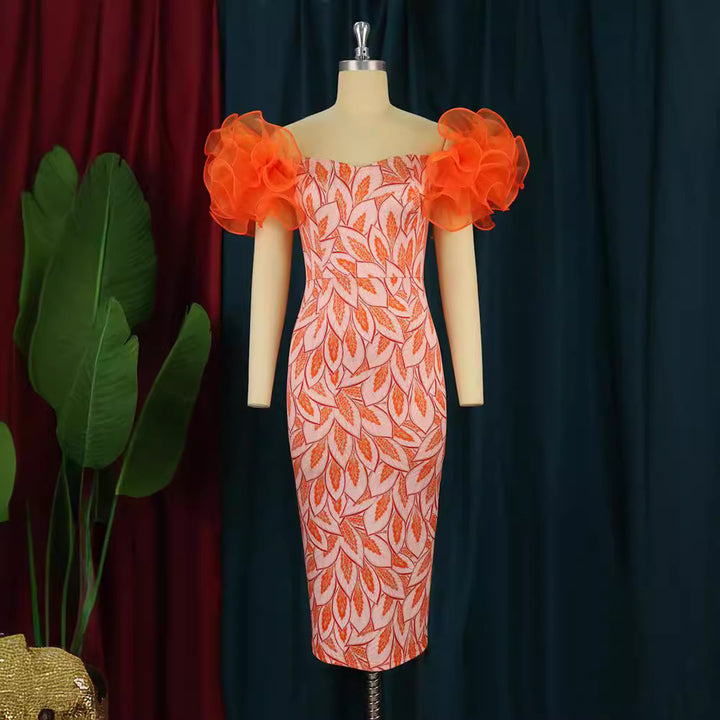 Damer Elegant Midi-klänning med innovativa puffärmar och konstnärlig tryck Mirla-Eva Jonsson