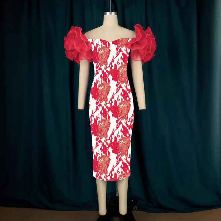 Damer Elegant Midi-klänning med innovativa puffärmar och konstnärlig tryck Mirla-Eva Jonsson