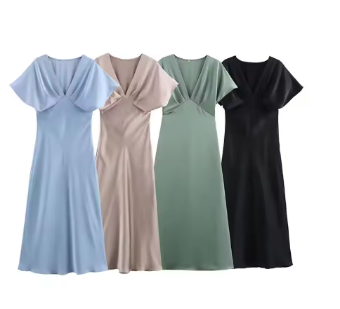 Damer Elegant Midi-klänning med puffärmar och figursydd design Mirla-Eva Jonsson