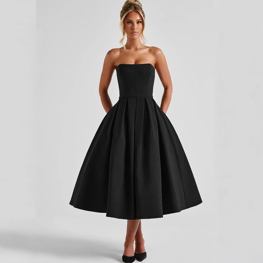 Damer Elegant Midi-klänning med svängande kjol och raffinerad bandeau-urringning Mirla-Eva Jonsson
