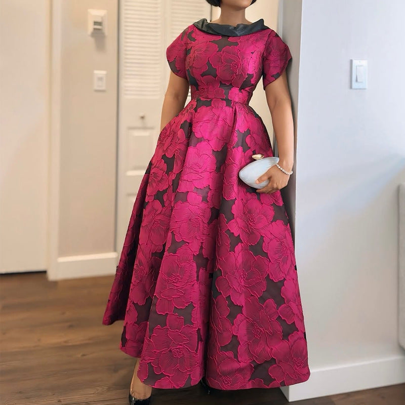 Damer Elegant Midikjol med blommönster och strukturerad överdel Mirla-Eva Jonsson