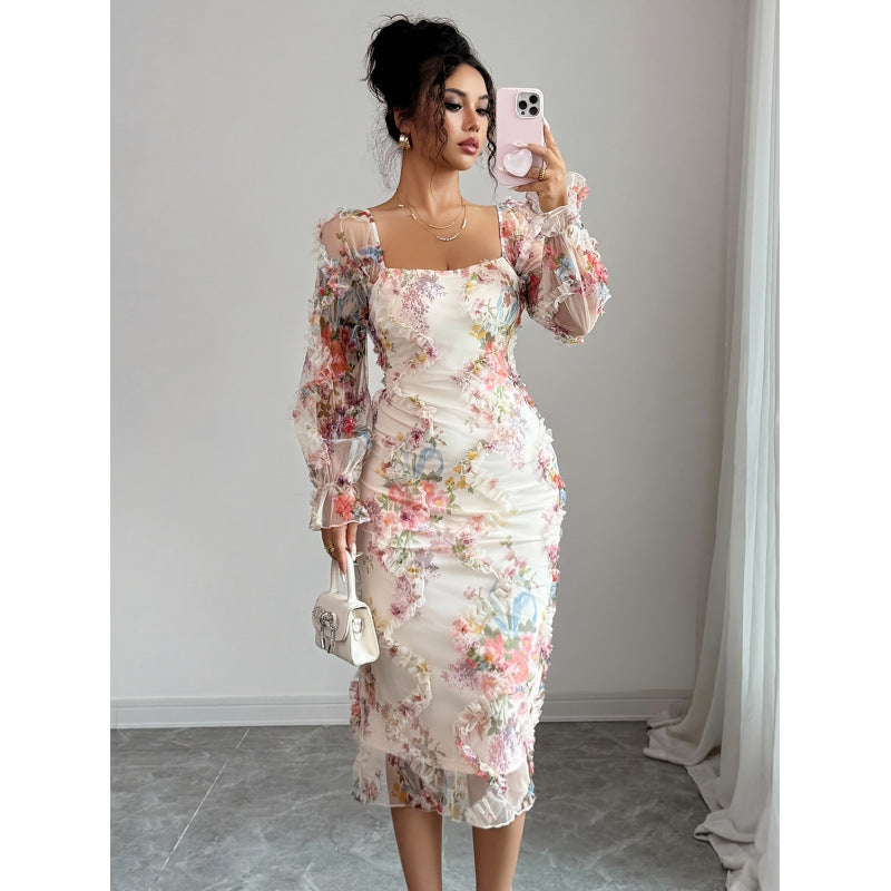 Damer Elegant Midikläder med blommiga spetsärmar och volangdetaljer Mirla-Eva Jonsson