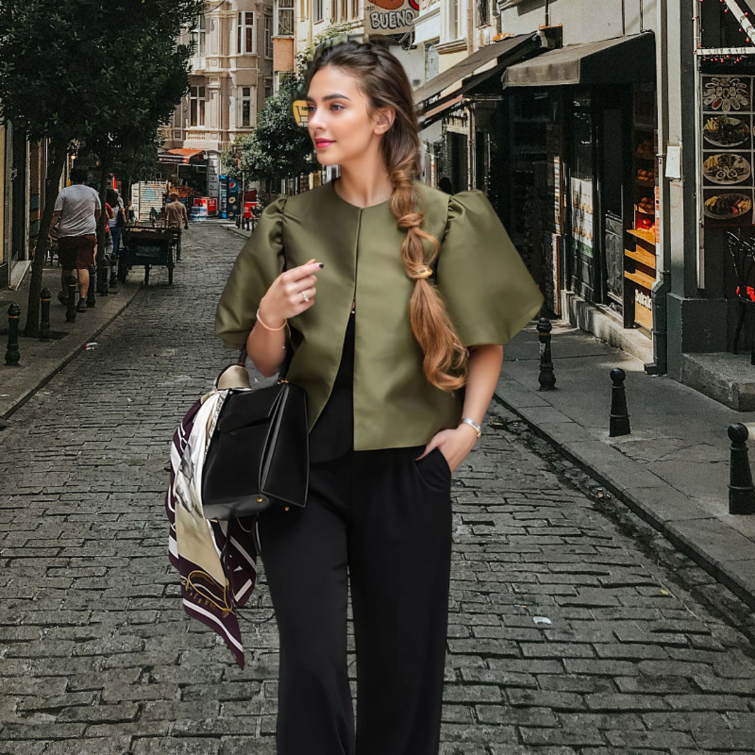 Damer Elegant Midiklänning med strukturerad överdel och voluminösa ärmar Eva Jonsson-Eva Jonsson