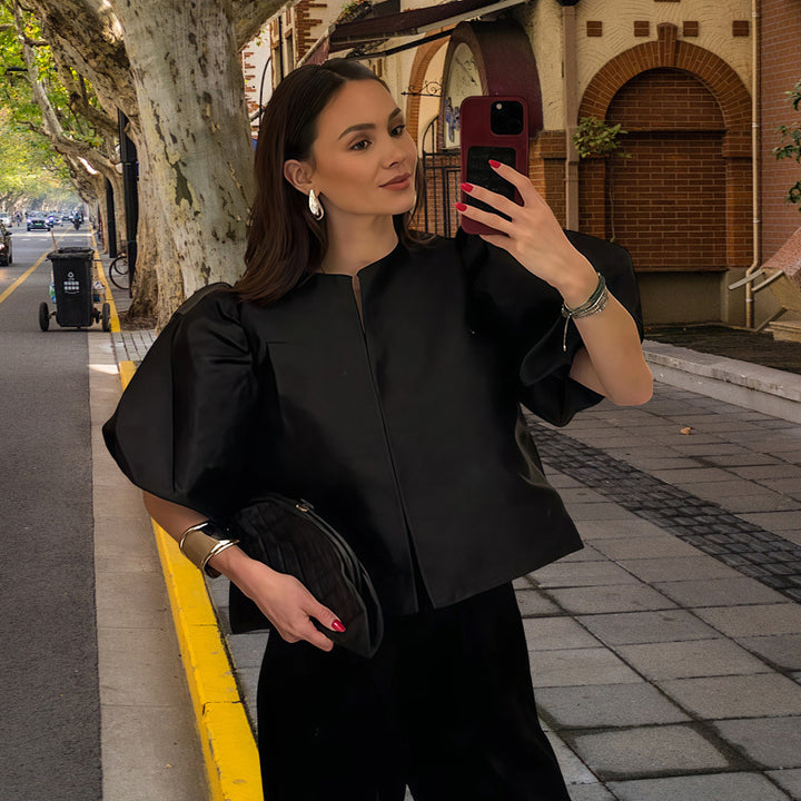 Damer Elegant Midiklänning med strukturerad överdel och voluminösa ärmar Eva Jonsson-Eva Jonsson