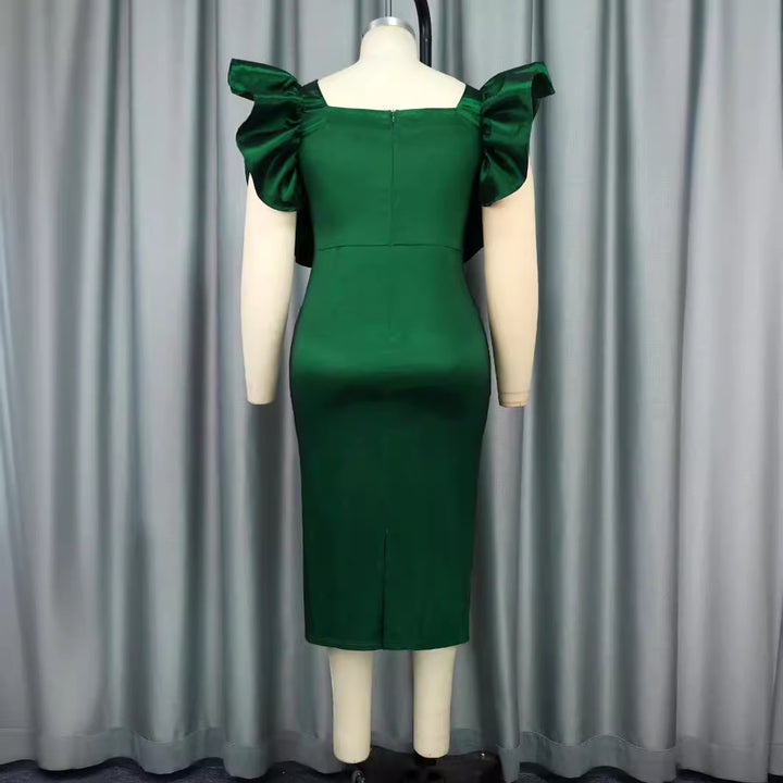 Damer Elegant Midiklänning med voluminösa puffärm armar Mirla-Eva Jonsson