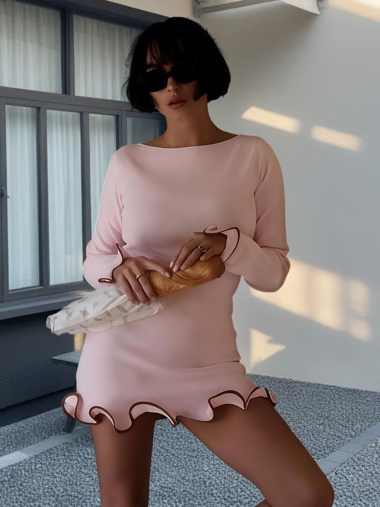 Damer Elegant Miniklänning med vågformad nederkant och långa ärmar Mirla-Eva Jonsson