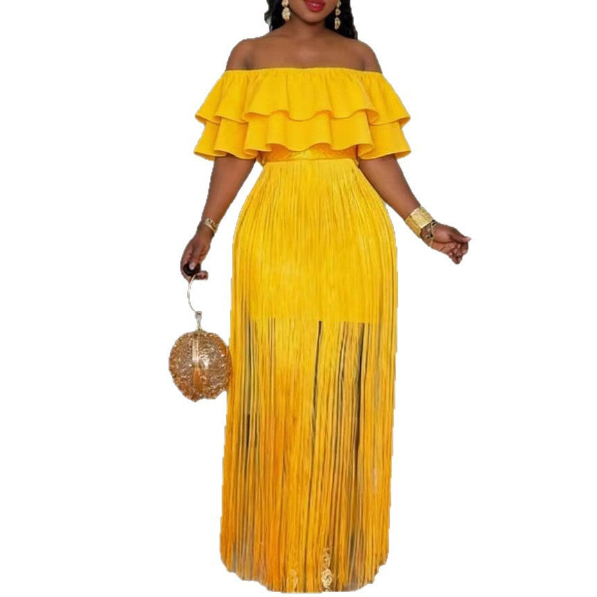 Damer Elegant Off-Shoulder Klänning med voluminöst Rüschensaum och fransigt Design Mirla-Eva Jonsson