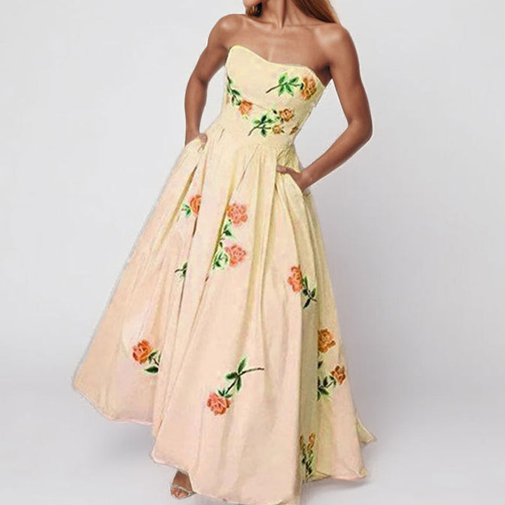 Damer Elegant Off-Shoulder Maxi Klänning med Blommönster och Sidofickor Mirla-Eva Jonsson