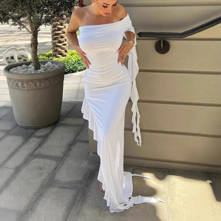 Damer Elegant Off-Shoulder Maxiklänning med asymmetrisk fåll och volangdetaljer Eva Jonsson-Eva Jonsson
