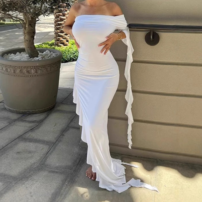 Damer Elegant Off-Shoulder Maxiklänning med asymmetrisk fåll och volangdetaljer Eva Jonsson-Eva Jonsson