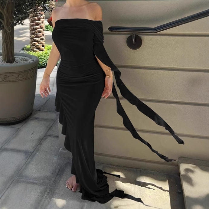 Damer Elegant Off-Shoulder Maxiklänning med asymmetrisk fåll och volangdetaljer Eva Jonsson-Eva Jonsson