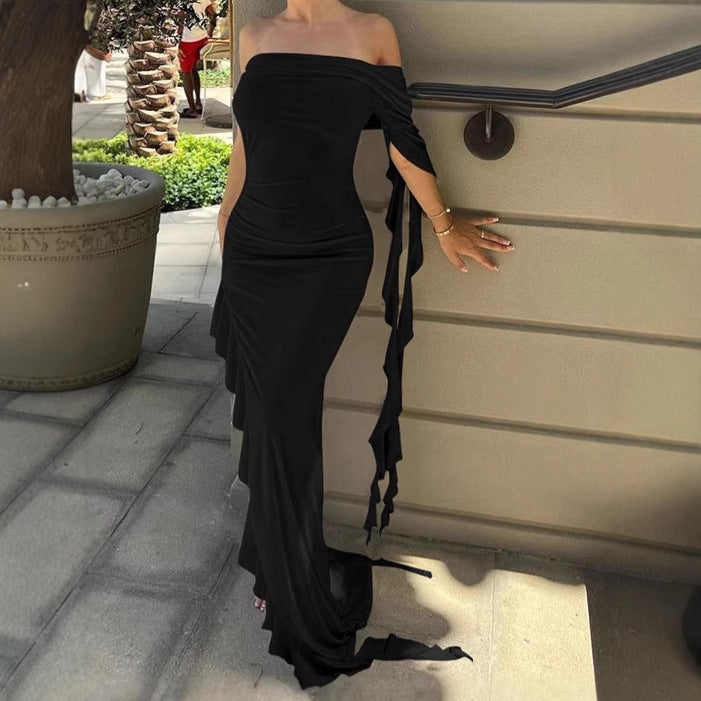 Damer Elegant Off-Shoulder Maxiklänning med asymmetrisk fåll och volangdetaljer Eva Jonsson-Eva Jonsson