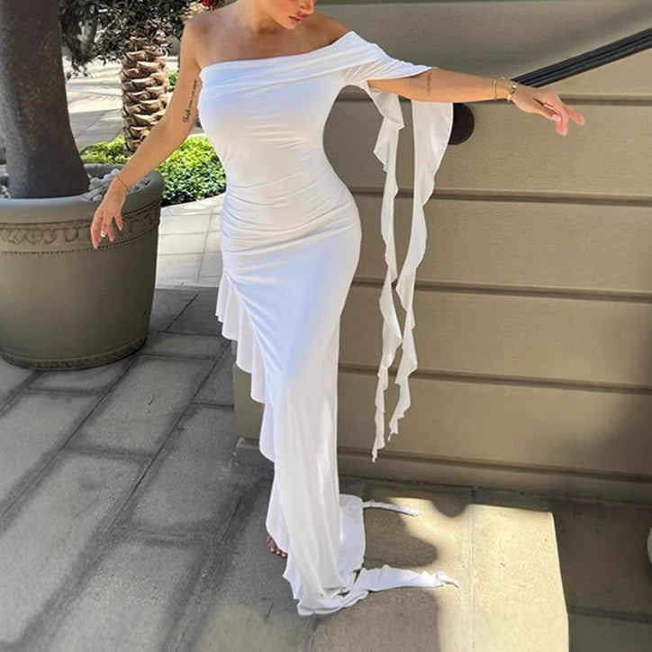 Damer Elegant Off-Shoulder Maxiklänning med asymmetrisk fåll och volangdetaljer Eva Jonsson-Eva Jonsson