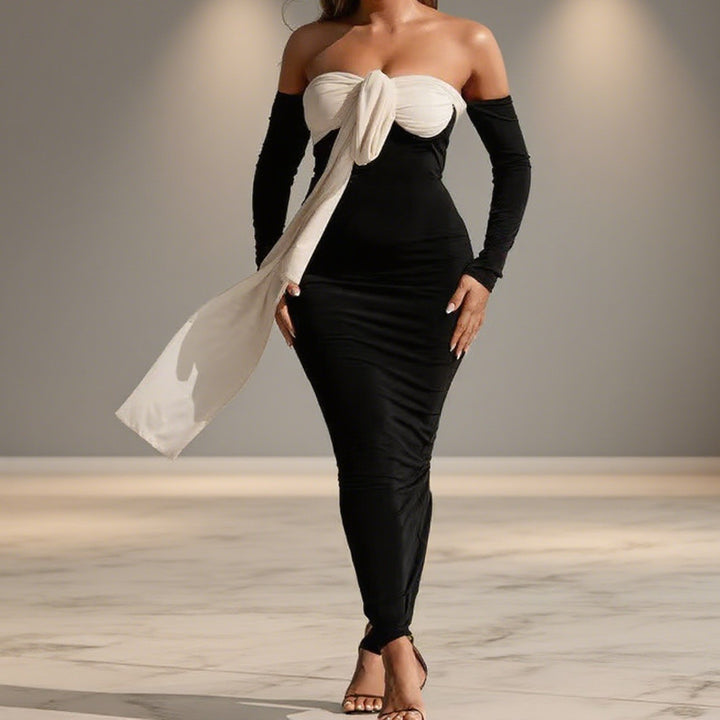 Damer Elegant Off-Shoulder Maxiklänning med dekorativ knut och långa ärmar Mirla-Eva Jonsson