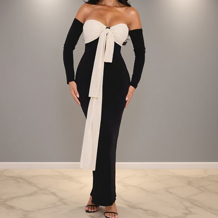 Damer Elegant Off-Shoulder Maxiklänning med dekorativ knut och långa ärmar Mirla-Eva Jonsson