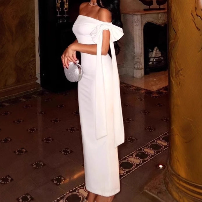 Damer Elegant Off-Shoulder Maxiklänning med figursmickrande skärning och svängande fåll Mirla-Eva Jonsson