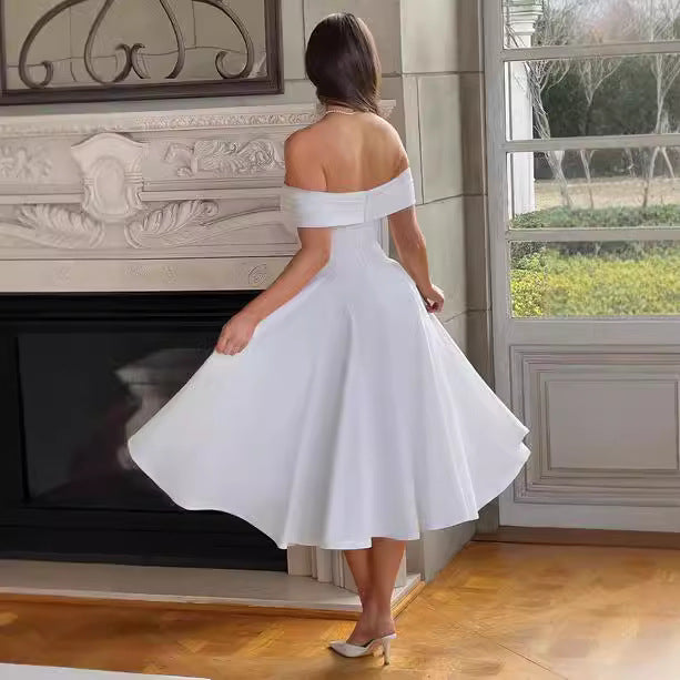 Damer Elegant Off-Shoulder Midiklänning med utstickande veck och fickor Mirla-Eva Jonsson