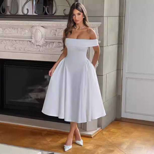 Damer Elegant Off-Shoulder Midiklänning med utstickande veck och fickor Mirla-Eva Jonsson