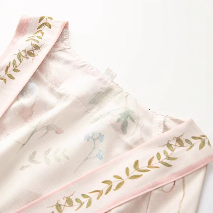 Damer Elegant Omslagklänning med blommönster och elastiskt midjeband Mirla-Eva Jonsson