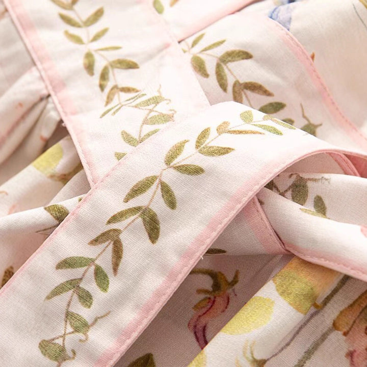 Damer Elegant Omslagklänning med blommönster och elastiskt midjeband Mirla-Eva Jonsson