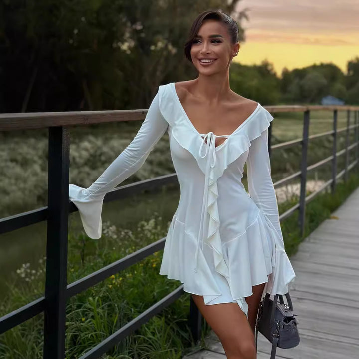 Damer Elegant Omslagsklänning med Volangdetaljer och Figurformande Snitt Eva Jonsson-Eva Jonsson