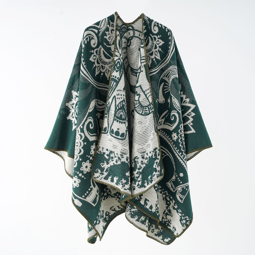 Damer Elegant Övergångs-Poncho med Konstnärligt Blommönster och Fransiga Avslutningar Mirla-Eva Jonsson