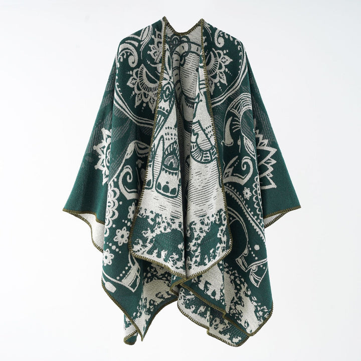 Damer Elegant Övergångs-Poncho med Konstnärligt Blommönster och Fransiga Avslutningar Mirla-Eva Jonsson