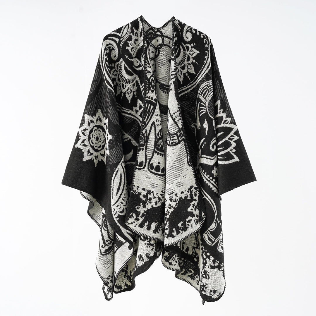 Damer Elegant Övergångs-Poncho med Konstnärligt Blommönster och Fransiga Avslutningar Mirla-Eva Jonsson