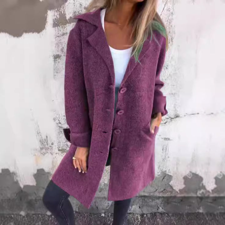 Damer Elegant Oversize-Ullkappa med Genomgående Knappslå och Praktiska Fickor Mirla-Eva Jonsson