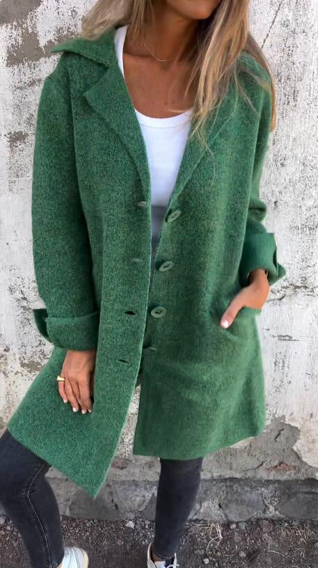 Damer Elegant Oversize-Ullkappa med Genomgående Knappslå och Praktiska Fickor Mirla-Eva Jonsson