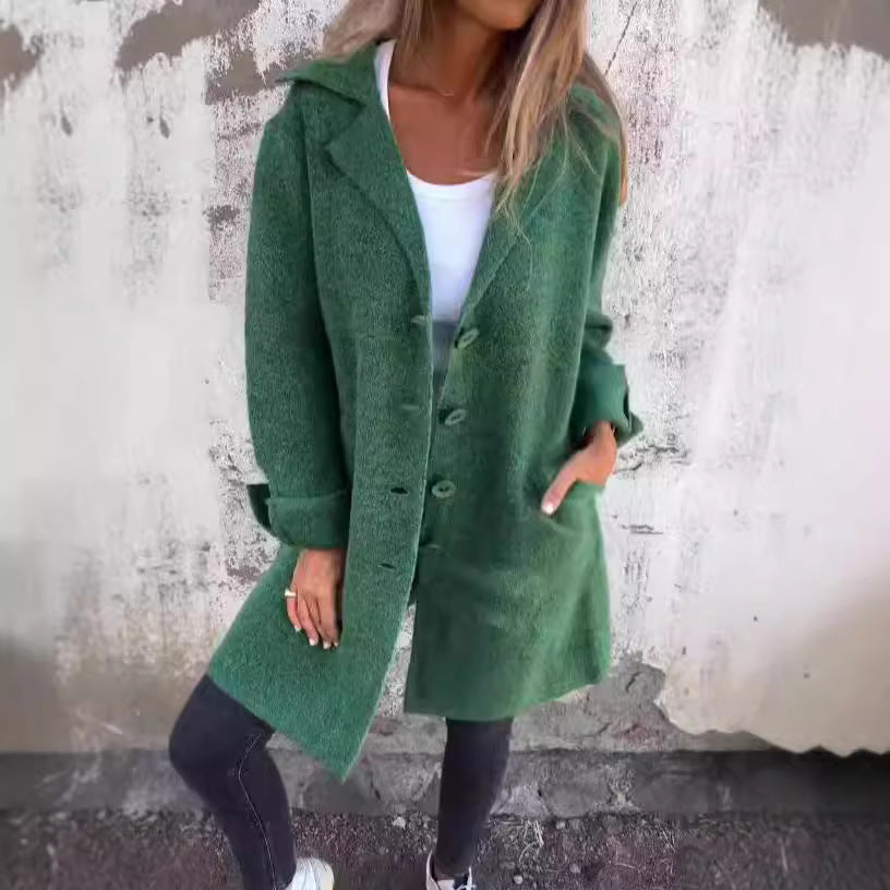 Damer Elegant Oversize-Ullkappa med Genomgående Knappslå och Praktiska Fickor Mirla-Eva Jonsson