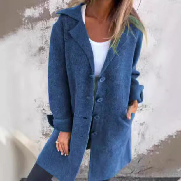 Damer Elegant Oversize-Ullkappa med Genomgående Knappslå och Praktiska Fickor Mirla-Eva Jonsson