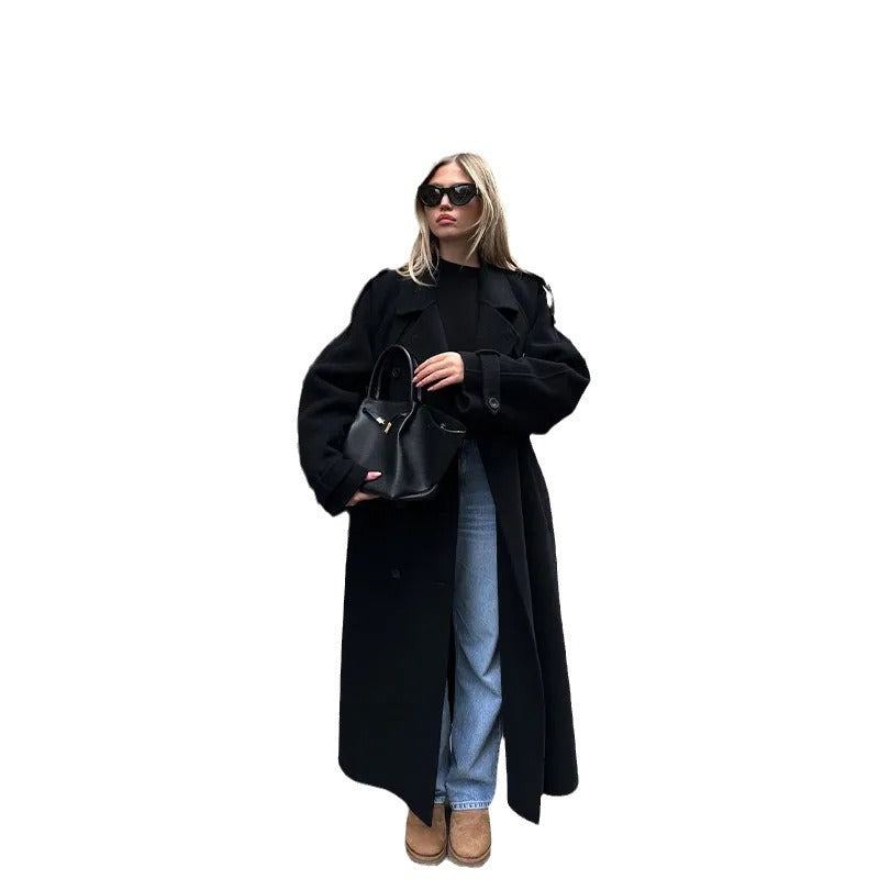 Damer Elegant Oversized-Trenchcoat med stiligt bälte och breda ärmar Mirla-Eva Jonsson
