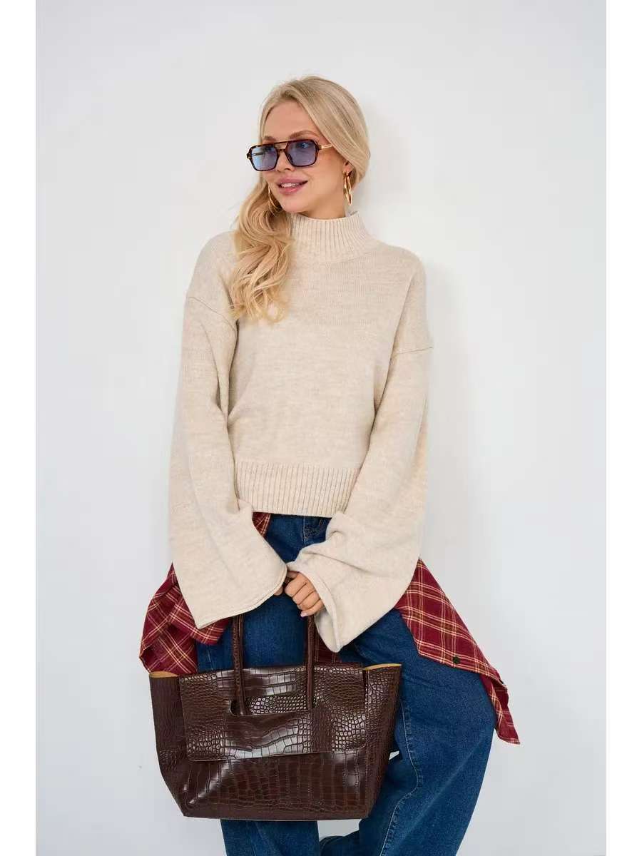 Damer Elegant Oversized Tröja med Brett Snitt och Hög Krage Mirla-Eva Jonsson